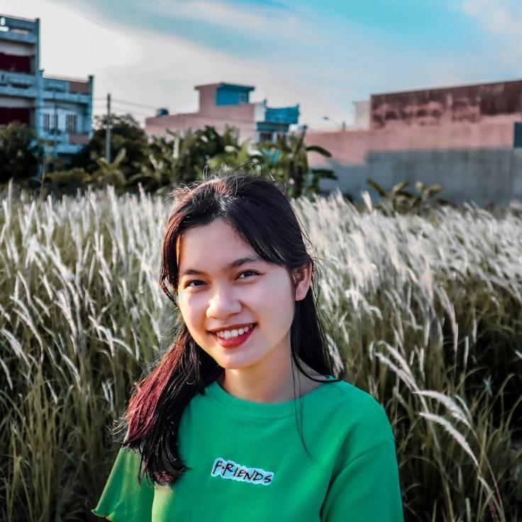 Kaveri Mehta, Lead Design Curator at Crystal Harbor Central, reviewing corporate floral arrangements